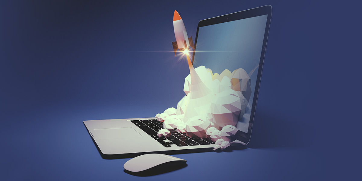 A digital illustration of a rocket launching out of a laptop screen, with clouds of smoke surrounding the rocket, symbolizing technology, innovation, or a startup concept. A computer mouse is next to the laptop.